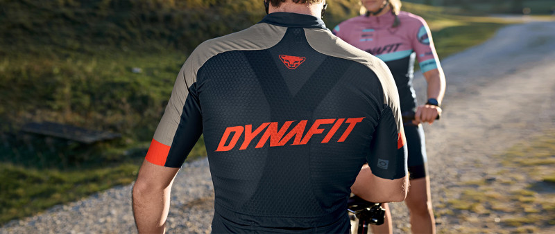 Rear view of a mountain biking athlete in the DYNAFIT special collection