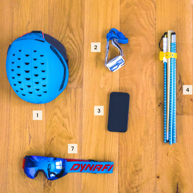 Top, from left to right: helmet, headlamp, probe, shovel (blade and shaft) Bottom from left to right: Goggles, smartphone, transceiver.