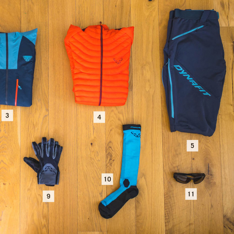 Top from left to right: Mid layer, base layer, hardshell jacket, down jacket, touring pant Bottom from left to right: Hat, neck gaiter, headband, gloves, socks, sunglasses